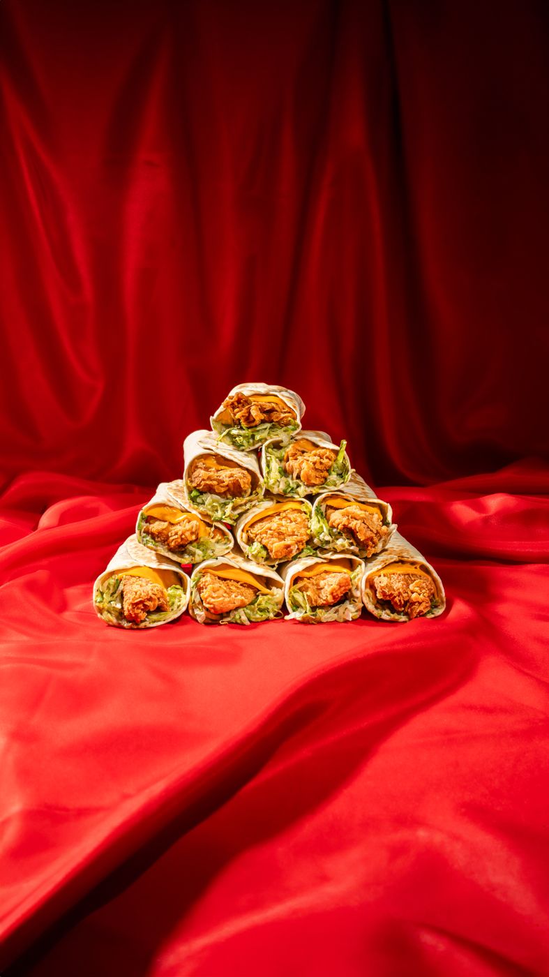 A pyramid of Big Boy Wraps on red velvet